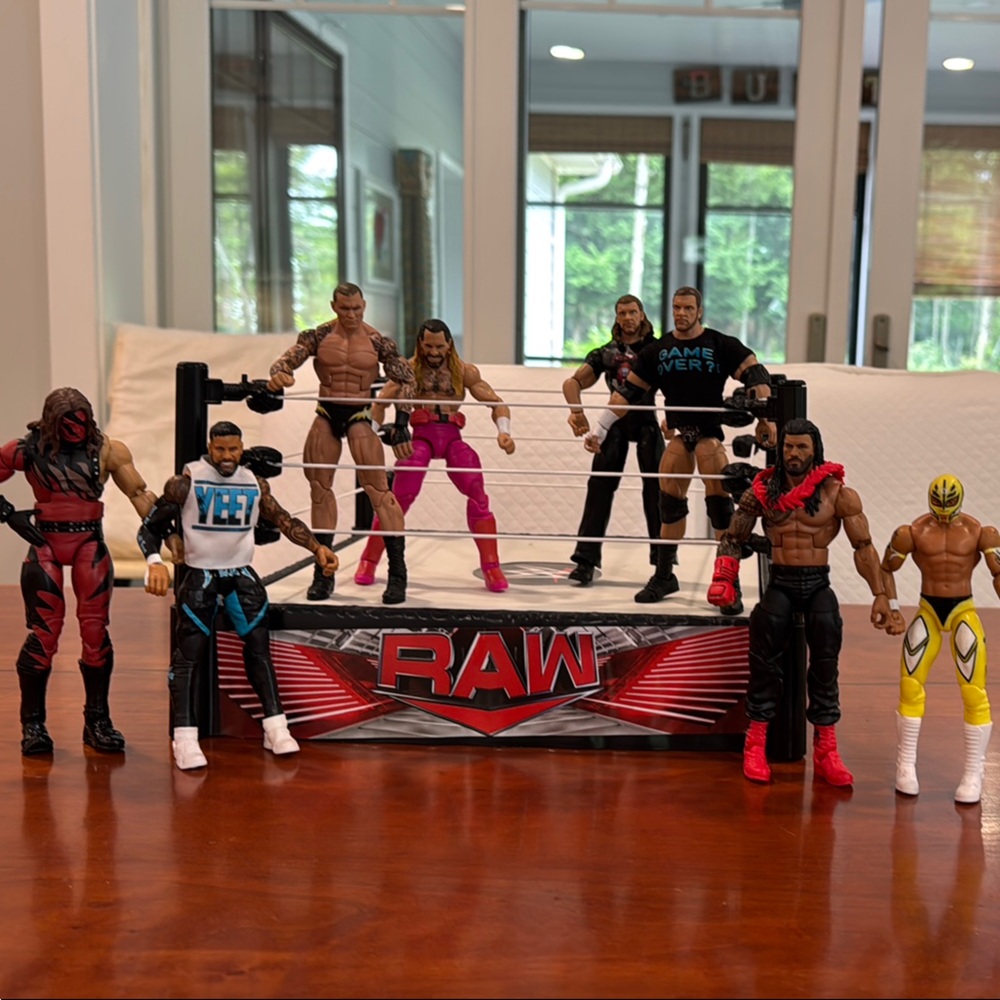 WWE Action Figures with spring loaded wrestling ring